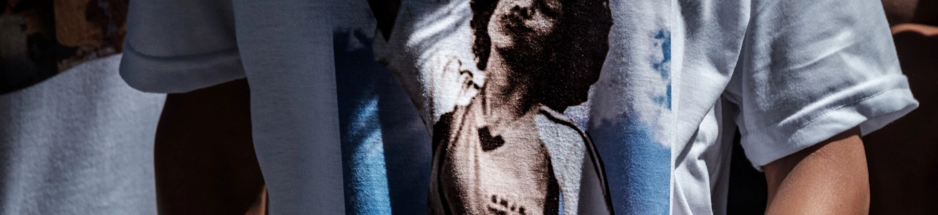 A friend of 13-year-old Maria Eduarda Alves da Conceicao who was killed by stray bullets while in a gym class at her public school on March 30 wears a farewell t-shirt during her funeral in Mesquita, north of Rio de Janeiro, Brazil, on April 1, 2017. / AFP PHOTO / YASUYOSHI CHIBA (Photo credit should read YASUYOSHI CHIBA/AFP/Getty Images) A friend of 13-year-old Maria Eduarda Alves da Conceicao who was killed by stray bullets while in a gym class at her public school on March 30 wears a farewell t-shirt during her funeral in Mesquita, north of Rio de Janeiro, Brazil, on April 1, 2017. / AFP PHOTO / YASUYOSHI CHIBA (Photo credit should read YASUYOSHI CHIBA/AFP/Getty Images)