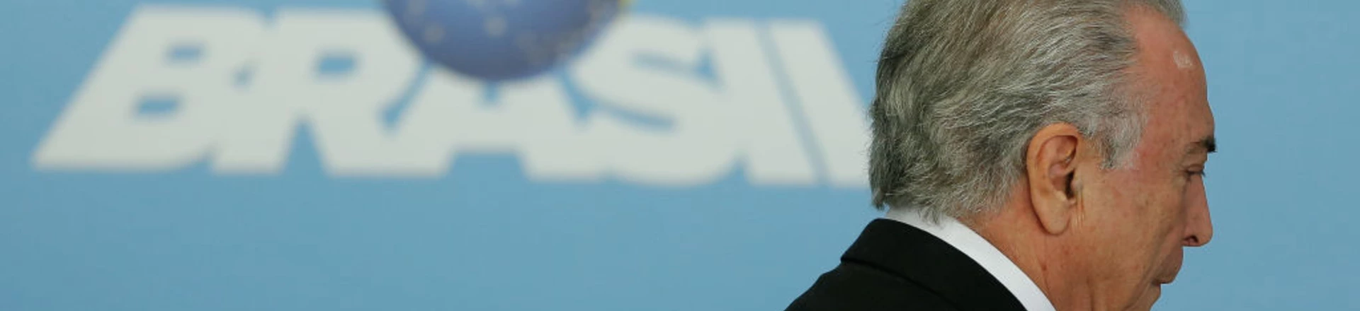 Brazil's President Michel Temer arrives for a ceremony to announce the airports' franchise programme, at the Planalto Palace in Brasilia, Brazil on July 27, 2017. 
Brazilian President Michel Temer's popularity fell from 10 percent in March to a meager 5 percent, according to a poll released on Thursday in the prelude to the voting at the Chamber of Deputies to decide if a corruption report against the conservative leader advances to the supreme court. / AFP PHOTO / Sergio LIMA        (Photo credit should read SERGIO LIMA/AFP/Getty Images) Brazil's President Michel Temer arrives for a ceremony to announce the airports' franchise programme, at the Planalto Palace in Brasilia, Brazil on July 27, 2017. 
Brazilian President Michel Temer's popularity fell from 10 percent in March to a meager 5 percent, according to a poll released on Thursday in the prelude to the voting at the Chamber of Deputies to decide if a corruption report against the conservative leader advances to the supreme court. / AFP PHOTO / Sergio LIMA        (Photo credit should read SERGIO LIMA/AFP/Getty Images)