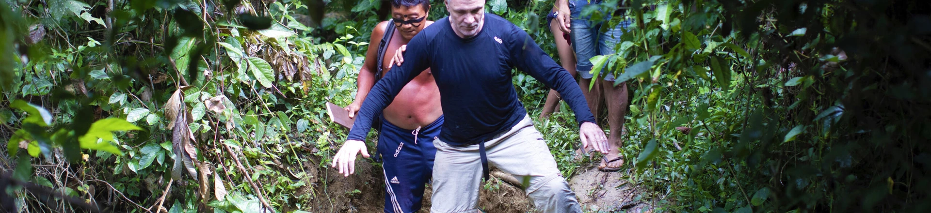 British journalist Dom Phillips, right, and a Yanomami Indigenous man walk in Maloca Papiu village, Roraima state, Brazil, Nov. 2019. Phillips and Indigenous affairs expert Bruno Araujo Pereira have been reported missing in a remote part of Brazil's Amazon region, a local Indigenous association said Monday, June 6, 2022. (AP Photo/Joao Laet) British journalist Dom Phillips, right, and a Yanomami Indigenous man walk in Maloca Papiu village, Roraima state, Brazil, Nov. 2019. Phillips and Indigenous affairs expert Bruno Araujo Pereira have been reported missing in a remote part of Brazil's Amazon region, a local Indigenous association said Monday, June 6, 2022. (AP Photo/Joao Laet)