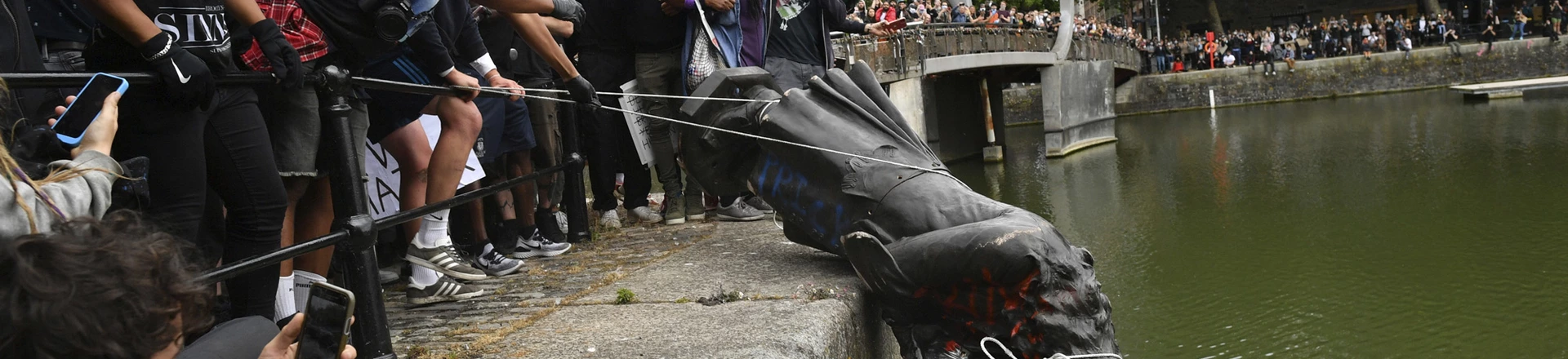 Black Lives Matter protests. Protesters throw statue of Edward Colston into Bristol harbour during a Black Lives Matter protest rally, in memory of George Floyd who was killed on May 25 while in police custody in the US city of Minneapolis. Picture date: Sunday June 7, 2020. See PA story POLICE Floyd. Photo credit should read: Ben Birchall/PA Wire URN:54052046 (Press Association via AP Images) Black Lives Matter protests. Protesters throw statue of Edward Colston into Bristol harbour during a Black Lives Matter protest rally, in memory of George Floyd who was killed on May 25 while in police custody in the US city of Minneapolis. Picture date: Sunday June 7, 2020. See PA story POLICE Floyd. Photo credit should read: Ben Birchall/PA Wire URN:54052046 (Press Association via AP Images)