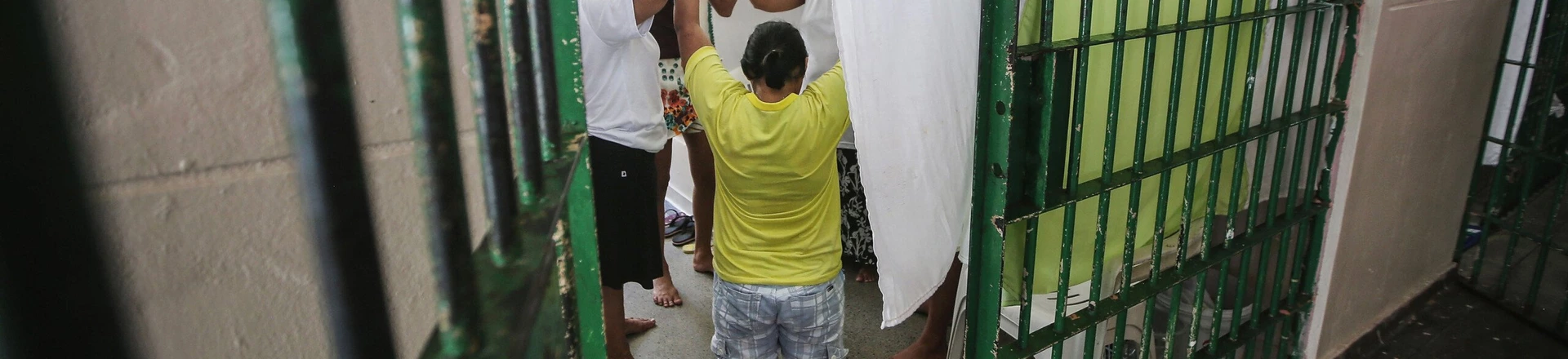 MANAUS, BRAZIL - FEBRUARY 17:  Inmates pray inside a cell in the women's section of the Anisio Jobim penitentiary complex on February 17, 2016 in Manaus, Brazil. The men's section of the prison holds over 1,200 inmates, more than twice as many as it was designed for. Brazil now holds the fourth-largest prison population in the world, behind the U.S., Russia and China, with the number of Brazilians behind bars nearly doubling in the past decade. The prison system currently holds more than 600,000 inmates, 61 percent over capacity, according to Human Rights Watch.  (Photo by Mario Tama/Getty Images) MANAUS, BRAZIL - FEBRUARY 17:  Inmates pray inside a cell in the women's section of the Anisio Jobim penitentiary complex on February 17, 2016 in Manaus, Brazil. The men's section of the prison holds over 1,200 inmates, more than twice as many as it was designed for. Brazil now holds the fourth-largest prison population in the world, behind the U.S., Russia and China, with the number of Brazilians behind bars nearly doubling in the past decade. The prison system currently holds more than 600,000 inmates, 61 percent over capacity, according to Human Rights Watch.  (Photo by Mario Tama/Getty Images)