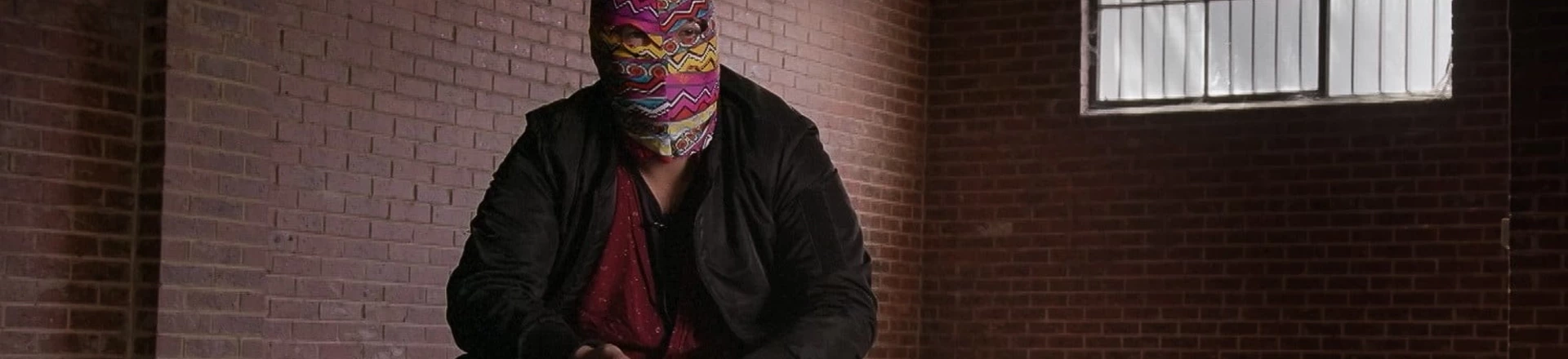 Por anos, Badiucao usou máscaras em aparições públicas para esconder sua identidade do governo chinês. Por anos, Badiucao usou máscaras em aparições públicas para esconder sua identidade do governo chinês.