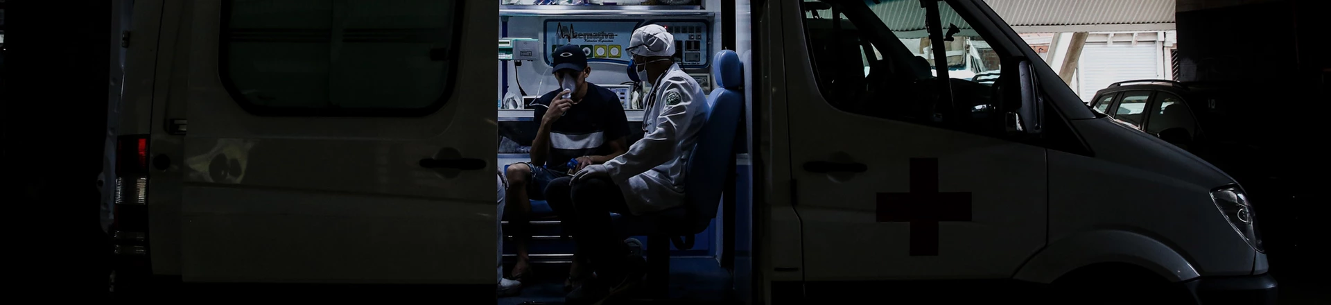 Ricardo Vieira, 41 years old surgeon attends a resident of Paraisopolis, Felipe dos Santos, 23 years old unemployed on April 7, 2020 in Sao Paulo, Brazil.  Ricardo Vieira, 41 years old surgeon attends a resident of Paraisopolis, Felipe dos Santos, 23 years old unemployed on April 7, 2020 in Sao Paulo, Brazil.