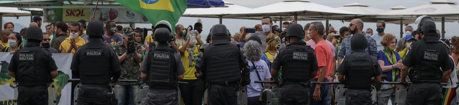 RIO DE JANEIRO, BRAZIL - JUNE 07: Police officers stand during a rally on support of Brazils President Jair Bolsonaro at Copacabana beach on June 07, 2020 in Rio de Janeiro, Brazil. (Photo by Andre Coelho/Getty Images) RIO DE JANEIRO, BRAZIL - JUNE 07: Police officers stand during a rally on support of Brazils President Jair Bolsonaro at Copacabana beach on June 07, 2020 in Rio de Janeiro, Brazil. (Photo by Andre Coelho/Getty Images)