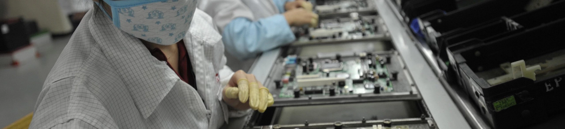 This photo taken on May 27, 2010 shows Chinese workers in the Foxconn factory in Shenzhen, in southern China's Guangdong province. A labour rights group said on June 28, it had found "deplorable" conditions at Apple suppliers in China, following a probe of several firms that supply the US technology giant. CHINA OUT AFP PHOTO (Photo credit should read STR/AFP/GettyImages) This photo taken on May 27, 2010 shows Chinese workers in the Foxconn factory in Shenzhen, in southern China's Guangdong province. A labour rights group said on June 28, it had found "deplorable" conditions at Apple suppliers in China, following a probe of several firms that supply the US technology giant. CHINA OUT AFP PHOTO (Photo credit should read STR/AFP/GettyImages)