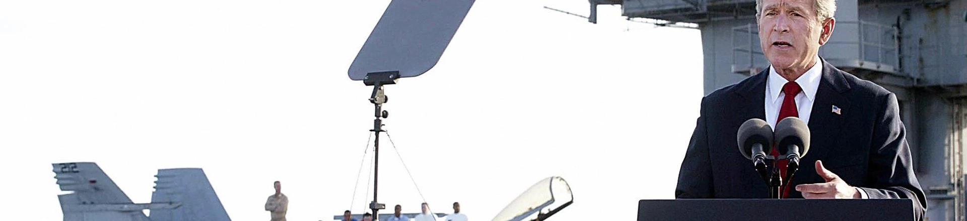USS ABRAHAM LINCOLN, AT SEA: (FILES) -- A file photo taken 01 May 2003 shows US President George W. Bush addressing the nation aboard the nuclear aircraft carrier USS Abraham Lincoln as it sails for Naval Air Station North Island, San Diego, California. Four years after the US-led invasion of Iraq, commanders are in fact pouring 25,000 reinforcements into Baghdad to quell Sunni-Shiite fighting, the bloodiest element of the conflict and one which even the Pentagon admits now amounts to civil war. AFP Photo / Stephen JAFFE (Photo credit should read STEPHEN JAFFE/AFP/Getty Images) USS ABRAHAM LINCOLN, AT SEA: (FILES) -- A file photo taken 01 May 2003 shows US President George W. Bush addressing the nation aboard the nuclear aircraft carrier USS Abraham Lincoln as it sails for Naval Air Station North Island, San Diego, California. Four years after the US-led invasion of Iraq, commanders are in fact pouring 25,000 reinforcements into Baghdad to quell Sunni-Shiite fighting, the bloodiest element of the conflict and one which even the Pentagon admits now amounts to civil war. AFP Photo / Stephen JAFFE (Photo credit should read STEPHEN JAFFE/AFP/Getty Images)