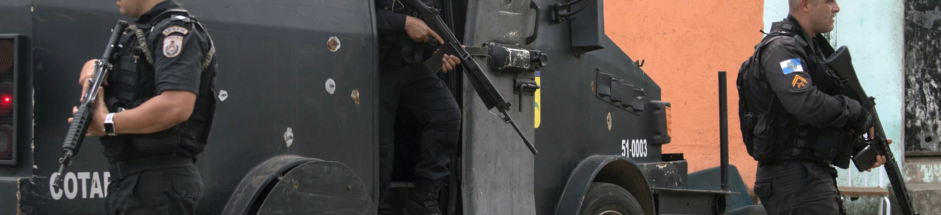 Military Police officers patrol during an operation at "Cidade de Deus" (City of God) favela in Rio de Janeiro, Brazil, on May 03, 2018. (Photo by MAURO PIMENTEL / AFP)        (Photo credit should read MAURO PIMENTEL/AFP/Getty Images)