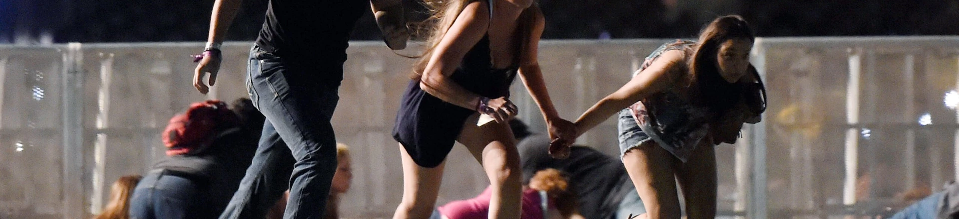 LAS VEGAS, NV - OCTOBER 01: People run from the Route 91 Harvest country music festival after apparent gun fire was hear on October 1, 2017 in Las Vegas, Nevada. A gunman has opened fire on a music festival in Las Vegas, leaving at least 20 people dead and more than 100 injured. Police have confirmed that one suspect has been shot. The investigation is ongoing. (Photo by David Becker/Getty Images) LAS VEGAS, NV - OCTOBER 01: People run from the Route 91 Harvest country music festival after apparent gun fire was hear on October 1, 2017 in Las Vegas, Nevada. A gunman has opened fire on a music festival in Las Vegas, leaving at least 20 people dead and more than 100 injured. Police have confirmed that one suspect has been shot. The investigation is ongoing. (Photo by David Becker/Getty Images)