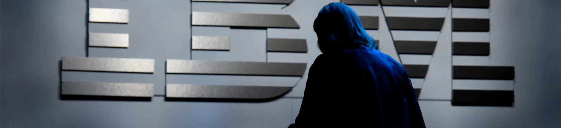 he silhouette of Virginia 'Ginni' Rometty, chief executive officer of International Business Machines Corp. (IBM), is seen exiting the stage after an event during the 2016 Consumer Electronics Show (CES) in Las Vegas, Nevada, U.S., on Wednesday, Jan. 6, 2016. CES is expected to bring a range of announcements from major names in tech showcasing new developments in virtual reality, self-driving cars, drones, wearables, and the Internet of Things. Photographer: David Paul Morris/Bloomberg via Getty Images he silhouette of Virginia 'Ginni' Rometty, chief executive officer of International Business Machines Corp. (IBM), is seen exiting the stage after an event during the 2016 Consumer Electronics Show (CES) in Las Vegas, Nevada, U.S., on Wednesday, Jan. 6, 2016. CES is expected to bring a range of announcements from major names in tech showcasing new developments in virtual reality, self-driving cars, drones, wearables, and the Internet of Things. Photographer: David Paul Morris/Bloomberg via Getty Images