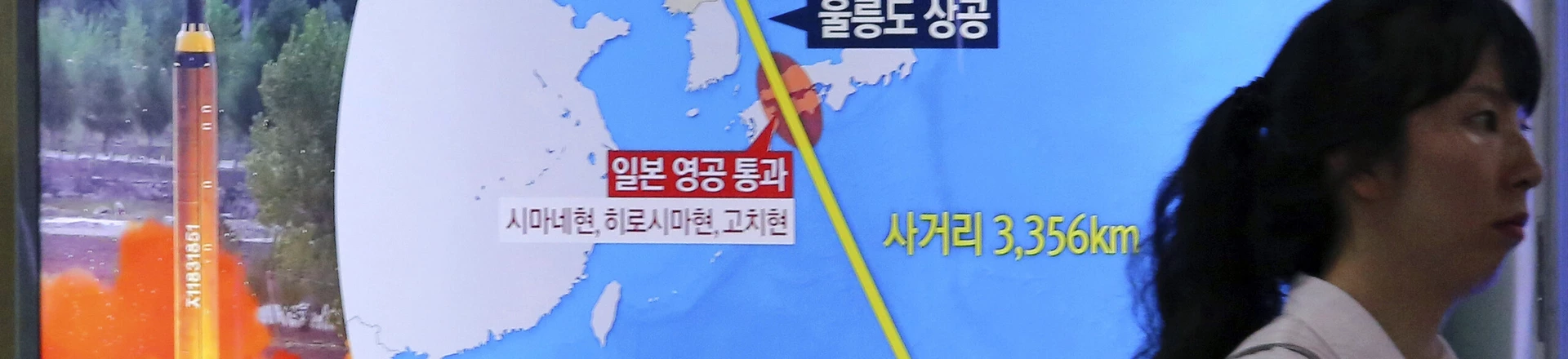 A woman passes by a TV screen showing a local news program reporting on North Korea's threats to strike Guam with missiles at the Seoul Train Station in Seoul, South Korea, Thursday, Aug. 10, 2017. North Korea has announced a detailed plan to launch a salvo of ballistic missiles toward the U.S. Pacific territory of Guam, a major military hub and home to U.S. bombers. If carried out, it would be the North's most provocative missile launch to date. The signs at left top read " North Korea announced a plan to launch a salvo of ballistic missiles toward the Guam. (AP Photo/Ahn Young-Joon) A woman passes by a TV screen showing a local news program reporting on North Korea's threats to strike Guam with missiles at the Seoul Train Station in Seoul, South Korea, Thursday, Aug. 10, 2017. North Korea has announced a detailed plan to launch a salvo of ballistic missiles toward the U.S. Pacific territory of Guam, a major military hub and home to U.S. bombers. If carried out, it would be the North's most provocative missile launch to date. The signs at left top read " North Korea announced a plan to launch a salvo of ballistic missiles toward the Guam. (AP Photo/Ahn Young-Joon)