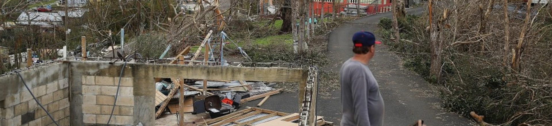 HAYALES DE COAMO, PUERTO RICO - SEPTEMBER 24: Telesforo Menendez surveys the damage in his neighborhood September 24, 2017 in Hayales de Coamo, Puerto Rico. Puerto Rico experienced widespread damage after Hurricane Maria, a category 4 hurricane, passed through. (Photo by Joe Raedle/Getty Images) HAYALES DE COAMO, PUERTO RICO - SEPTEMBER 24: Telesforo Menendez surveys the damage in his neighborhood September 24, 2017 in Hayales de Coamo, Puerto Rico. Puerto Rico experienced widespread damage after Hurricane Maria, a category 4 hurricane, passed through. (Photo by Joe Raedle/Getty Images)