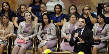TO GO WITH AFP STORYEvangelical minister and president of the House of Deputies' commission of human rights and minorities, Marco Feliciano, prays during a gathering of the Assembly of God church, in Goiania, Goias State, Brazil, on May 19, 2013. Feliciano's election is seen as a sign of the growing influence of evangelicals in Congress, where they have 67 deputies ot of a total 513, and in Brazilian politics in general. Evangelicals count 565 million adherents and represent more than one-fourth of the world's Christians, according to French researcher Sebastien Fath. AFP PHOTO / Evaristo SA (Photo credit should read EVARISTO SA/AFP/Getty Images)