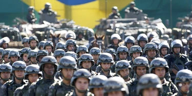 The Brazilian Army Command presents the military contingent that will work on the security of the 2013 FIFA Confederations Cup in Brasilia on June 13, 2013.  The security forces will be formed personnel from the Army and the Paramilitary Police. AFP PHOTO/Beto BARATA.        (Photo credit should read BETO BARATA/AFP/Getty Images) The Brazilian Army Command presents the military contingent that will work on the security of the 2013 FIFA Confederations Cup in Brasilia on June 13, 2013.  The security forces will be formed personnel from the Army and the Paramilitary Police. AFP PHOTO/Beto BARATA.        (Photo credit should read BETO BARATA/AFP/Getty Images)