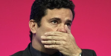 Federal Judge Sergio Moro gestures during an Economic Forum in Sao Paulo, Brazil, on August 31, 2015. Moro is in charge of the investigation of oil giant Petrobras corruption scandal.  AFP PHOTO /  NELSON ALMEIDA        (Photo credit should read NELSON ALMEIDA/AFP/Getty Images)