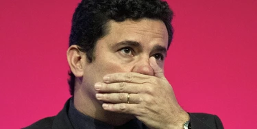 Federal Judge Sergio Moro gestures during an Economic Forum in Sao Paulo, Brazil, on August 31, 2015. Moro is in charge of the investigation of oil giant Petrobras corruption scandal. AFP PHOTO / NELSON ALMEIDA (Photo credit should read NELSON ALMEIDA/AFP/Getty Images) Federal Judge Sergio Moro gestures during an Economic Forum in Sao Paulo, Brazil, on August 31, 2015. Moro is in charge of the investigation of oil giant Petrobras corruption scandal. AFP PHOTO / NELSON ALMEIDA (Photo credit should read NELSON ALMEIDA/AFP/Getty Images)