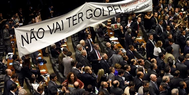 Brazilian pro-government deputies hold a banner reading "There will not be a coup" during the election of members for a special congressional commission that will be first up to analyze the impeachment case against President Dilma Rousseff, at the National Congress in Brasilia, on December 8, 2015. Pro-impeachment deputies got 39 out of 65 seats on the commission, which is tasked with making a recommendation to the full lower house on Rousseff's impeachment. AFP PHOTO/EVARISTO SA / AFP / EVARISTO SA (Photo credit should read EVARISTO SA/AFP/Getty Images) Brazilian pro-government deputies hold a banner reading "There will not be a coup" during the election of members for a special congressional commission that will be first up to analyze the impeachment case against President Dilma Rousseff, at the National Congress in Brasilia, on December 8, 2015. Pro-impeachment deputies got 39 out of 65 seats on the commission, which is tasked with making a recommendation to the full lower house on Rousseff's impeachment. AFP PHOTO/EVARISTO SA / AFP / EVARISTO SA (Photo credit should read EVARISTO SA/AFP/Getty Images)