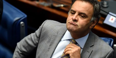 Senator Aecio Neves, who heads the PSDB opposition party, is pictured during a senate's session to form a committee that will consider whether to impeach President Dilma Rousseff, in Brasilia, on April 25, 2016.Brazil's Senate met Monday to form a committee that will consider whether to impeach Rousseff, who has accused her opponents of mounting a constitutional coup. She is accused of illegal government accounting maneuvers, but says she has not committed an impeachment-worthy crime. The Senate committee -- comprising 21 of the 81 senators -- was to debate Rousseff's fate for up to 10 working days before making a recommendation to the full upper house. / AFP / EVARISTO SA (Photo credit should read EVARISTO SA/AFP/Getty Images) Senator Aecio Neves, who heads the PSDB opposition party, is pictured during a senate's session to form a committee that will consider whether to impeach President Dilma Rousseff, in Brasilia, on April 25, 2016.Brazil's Senate met Monday to form a committee that will consider whether to impeach Rousseff, who has accused her opponents of mounting a constitutional coup. She is accused of illegal government accounting maneuvers, but says she has not committed an impeachment-worthy crime. The Senate committee -- comprising 21 of the 81 senators -- was to debate Rousseff's fate for up to 10 working days before making a recommendation to the full upper house. / AFP / EVARISTO SA (Photo credit should read EVARISTO SA/AFP/Getty Images)