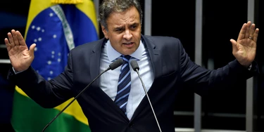 Brazilian senator Aecio Neves, from PSDB, delivers a speech during the debate in the Senate of a vote on suspending President Dilma Rousseff and launching an impeachment trial, in Brasilia on May 11, 2016. A simple majority in the 81-member Senate will trigger Rousseff's six-month suspension pending trial. A two-thirds majority would then be needed to remove her permanently. / AFP / EVARISTO SA (Photo credit should read EVARISTO SA/AFP/Getty Images) Brazilian senator Aecio Neves, from PSDB, delivers a speech during the debate in the Senate of a vote on suspending President Dilma Rousseff and launching an impeachment trial, in Brasilia on May 11, 2016. A simple majority in the 81-member Senate will trigger Rousseff's six-month suspension pending trial. A two-thirds majority would then be needed to remove her permanently. / AFP / EVARISTO SA (Photo credit should read EVARISTO SA/AFP/Getty Images)