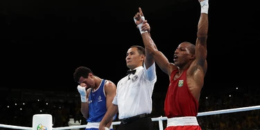 RIO DE JANEIRO, BRAZIL - AUGUST 16:  Robson Conceicao (R) of Brazil celebrates after winning gold against Sofiane Oumiha of France in the Men's Light (60kg) event on Day 11 of the Rio 2016 Olympic Games at Riocentro - Pavilion 6 on August 16, 2016 in Rio de Janeiro, Brazil.  (Photo by Christian Petersen/Getty Images) RIO DE JANEIRO, BRAZIL - AUGUST 16:  Robson Conceicao (R) of Brazil celebrates after winning gold against Sofiane Oumiha of France in the Men's Light (60kg) event on Day 11 of the Rio 2016 Olympic Games at Riocentro - Pavilion 6 on August 16, 2016 in Rio de Janeiro, Brazil.  (Photo by Christian Petersen/Getty Images)