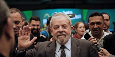 Brazil's former president (2003-2011) Luiz Inacio Lula da Silva waves during the second congress of the IndustriALL Global Union in Rio de Janeiro, Brazil on October 4, 2016.
IndustriALL Global Union represents workers in the mining, energy and manufacturing sectors in 140 countries around the world. / AFP / YASUYOSHI CHIBA        (Photo credit should read YASUYOSHI CHIBA/AFP/Getty Images) Brazil's former president (2003-2011) Luiz Inacio Lula da Silva waves during the second congress of the IndustriALL Global Union in Rio de Janeiro, Brazil on October 4, 2016.
IndustriALL Global Union represents workers in the mining, energy and manufacturing sectors in 140 countries around the world. / AFP / YASUYOSHI CHIBA        (Photo credit should read YASUYOSHI CHIBA/AFP/Getty Images)