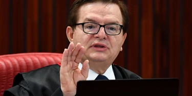 Supreme Electoral Court (TSE) Judge Herman Benjamin speaks during a session examining whether the 2014 reelection of president Dilma Rousseff and her then-vice president Temer should be invalidated because of corrupt campaign funding, in Brasilia, on June 7, 2017.Judges on Brazil's electoral court were expected to start voting Wednesday in a case that could topple scandal-tainted President Michel Temer. If the court votes to scrap the election result, Temer -- who took over only last year when Rousseff was impeached -- would himself risk losing his office. / AFP PHOTO / EVARISTO SA (Photo credit should read EVARISTO SA/AFP/Getty Images) Supreme Electoral Court (TSE) Judge Herman Benjamin speaks during a session examining whether the 2014 reelection of president Dilma Rousseff and her then-vice president Temer should be invalidated because of corrupt campaign funding, in Brasilia, on June 7, 2017.Judges on Brazil's electoral court were expected to start voting Wednesday in a case that could topple scandal-tainted President Michel Temer. If the court votes to scrap the election result, Temer -- who took over only last year when Rousseff was impeached -- would himself risk losing his office. / AFP PHOTO / EVARISTO SA (Photo credit should read EVARISTO SA/AFP/Getty Images)