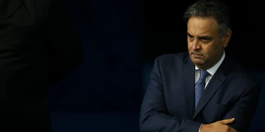 BRASÍLIA, DF, BRASIL, 16h00 - 04.07.2017 - O senador Aécio Neves (PSDB-MG) no plenário de Senado Federal, em Brasília (SP). Depois de 48 dias longe do Congresso, o senador Aécio Neves reassumiu nesta terça-feira (4) a atividade parlamentar após decisão do ministro do STF, Marco Aurélio Mello. (Foto: Pedro Ladeira/Folhapress) BRASÍLIA, DF, BRASIL, 16h00 - 04.07.2017 - O senador Aécio Neves (PSDB-MG) no plenário de Senado Federal, em Brasília (SP). Depois de 48 dias longe do Congresso, o senador Aécio Neves reassumiu nesta terça-feira (4) a atividade parlamentar após decisão do ministro do STF, Marco Aurélio Mello. (Foto: Pedro Ladeira/Folhapress)
