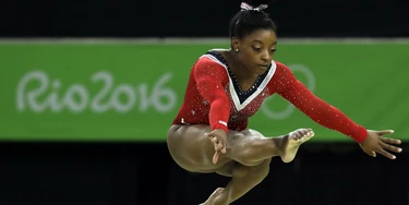 United States' Simone Biles performs on the balance beam during the artistic gymnastics women's apparatus final at the 2016 Summer Olympics in Rio de Janeiro, Brazil, Monday, Aug. 15, 2016. (AP Photo/Dmitri Lovetsky) United States' Simone Biles performs on the balance beam during the artistic gymnastics women's apparatus final at the 2016 Summer Olympics in Rio de Janeiro, Brazil, Monday, Aug. 15, 2016. (AP Photo/Dmitri Lovetsky)