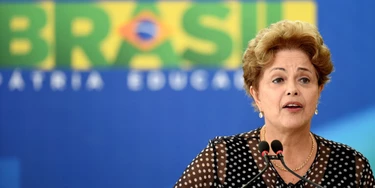 Brazilian President Dilma Rousseff speaks during inauguration ceremony of new Minister of Social Communication Edinho Silva at the Planalto Palace in Brasilia, Brazil, on 31 March 2015.  AFP PHOTO/EVARISTO SA        (Photo credit should read EVARISTO SA/AFP/Getty Images)