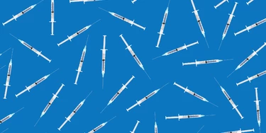 Many medical syringes scattered on blue background Many medical syringes scattered on blue background