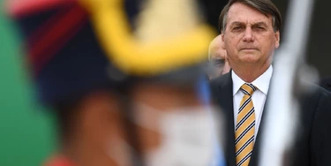 Brazilian President Jair Bolsonaro attends the National Flag Day celebration at Planalto Palace in Brasilia, on November 19, 2020. (Photo by EVARISTO SA / AFP) (Photo by EVARISTO SA/AFP via Getty Images) Brazilian President Jair Bolsonaro attends the National Flag Day celebration at Planalto Palace in Brasilia, on November 19, 2020. (Photo by EVARISTO SA / AFP) (Photo by EVARISTO SA/AFP via Getty Images)
