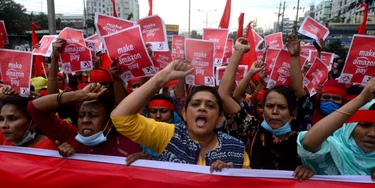 Activists of Sammilito Garments Sramik Federation (Combined Garments Workers Federation) stage a protest procession against the world's leading digital retailer Amazon.com demanding fair wages & union rights for all Amazon supply chain workers in Dhaka, Bangladesh, on November 27, 2020 (Photo by Mamunur Rashid/NurPhoto via Getty Images) Activists of Sammilito Garments Sramik Federation (Combined Garments Workers Federation) stage a protest procession against the world's leading digital retailer Amazon.com demanding fair wages & union rights for all Amazon supply chain workers in Dhaka, Bangladesh, on November 27, 2020 (Photo by Mamunur Rashid/NurPhoto via Getty Images)