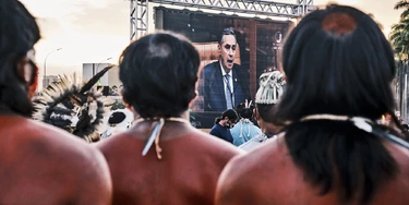 A screen shows Supreme Court Justice Luis Roberto Barroso during a protest against a land demarcation judgment outside the Supreme Court building in Brasilia, Brazil, on Wednesday, Aug. 25, 2021. Indigenous protesters have gathered in Brasilia this week to protest a Supreme Court judgment on Wednesday that could take away ancestral lands. Photographer: Gustavo Minas/Bloomberg via Getty Images A screen shows Supreme Court Justice Luis Roberto Barroso during a protest against a land demarcation judgment outside the Supreme Court building in Brasilia, Brazil, on Wednesday, Aug. 25, 2021. Indigenous protesters have gathered in Brasilia this week to protest a Supreme Court judgment on Wednesday that could take away ancestral lands. Photographer: Gustavo Minas/Bloomberg via Getty Images