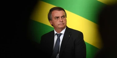 Brazilian President Jair Bolsonaro attends a ceremony for the signing of the consolidation of the new labor regulatory framework at the Planalto Palace in Brasilia, on November 10, 2021. (Photo by EVARISTO SA / AFP) (Photo by EVARISTO SA/AFP via Getty Images) Brazilian President Jair Bolsonaro attends a ceremony for the signing of the consolidation of the new labor regulatory framework at the Planalto Palace in Brasilia, on November 10, 2021. (Photo by EVARISTO SA / AFP) (Photo by EVARISTO SA/AFP via Getty Images)