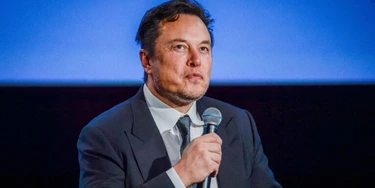 Tesla CEO Elon Musk looks up as he addresses guests at the Offshore Northern Seas 2022 (ONS) meeting in Stavanger, Norway on August 29, 2022. - The meeting, held in Stavanger from August 29 to September 1, 2022, presents the latest developments in Norway and internationally related to the energy, oil and gas sector. - Norway OUT (Photo by Carina Johansen / NTB / AFP) / Norway OUT (Photo by CARINA JOHANSEN/NTB/AFP via Getty Images)