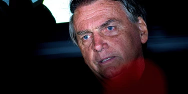 BRASILIA, BRAZIL - OCTOBER 02: Incumbent and candidate Jair Bolsonaro of Liberal Party (PL) talks during a press conference at the end of the general elections day at the main entrance of Alvorada Palace on October 02, 2022 in Brasilia, Brazil. According to official results, Candidate Luiz Inácio Lula da Silva of Workers’ Party (PT) has 48,40% of the votes and Incumbent and candidate Jair Bolsonaro of Liberal Party (PL) 43,22%, with 99,89 % of the voting counted. Lula and Bolosonaro will compete in the presidential runoff on October 30, 2022. (Photo by Andressa Anholete/Getty Images) BRASILIA, BRAZIL - OCTOBER 02: Incumbent and candidate Jair Bolsonaro of Liberal Party (PL) talks during a press conference at the end of the general elections day at the main entrance of Alvorada Palace on October 02, 2022 in Brasilia, Brazil. According to official results, Candidate Luiz Inácio Lula da Silva of Workers’ Party (PT) has 48,40% of the votes and Incumbent and candidate Jair Bolsonaro of Liberal Party (PL) 43,22%, with 99,89 % of the voting counted. Lula and Bolosonaro will compete in the presidential runoff on October 30, 2022. (Photo by Andressa Anholete/Getty Images)