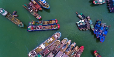 SANYA, CHINA - AUGUST 16: Fishing boats set sail from a harbor to catch fish in the South China Sea on August 16, 2017 in Sanya, Hainan Province of China. About 18,000 fishing boats set sail from Hainan to South China Sea for fishing on Wednesday. (Photo by Luo Yunfei/CHINA NEWS SERVICE/VCG via Getty Images) SANYA, CHINA - AUGUST 16: Fishing boats set sail from a harbor to catch fish in the South China Sea on August 16, 2017 in Sanya, Hainan Province of China. About 18,000 fishing boats set sail from Hainan to South China Sea for fishing on Wednesday. (Photo by Luo Yunfei/CHINA NEWS SERVICE/VCG via Getty Images)