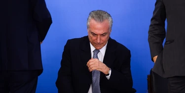 TOPSHOT - Brazilian acting President Michel Temer attends a meeting with business leaders next to his Finance Minister Henrique Meirelles (out of frame) at Planalto Palace in Brasilia, June 8, 2016.
Brazil's annual inflation rate crept up last month to 9.32 percent, officials said Wednesday, sounding new alarm bells for Latin America's largest economy as it struggles through a deep recession. The stubbornly high inflation rate had been looking somewhat better recently, falling in each of the past three months, to 9.28 percent in April. / AFP / ANDRESSA ANHOLETE (Photo credit should read ANDRESSA ANHOLETE/AFP/Getty Images) TOPSHOT - Brazilian acting President Michel Temer attends a meeting with business leaders next to his Finance Minister Henrique Meirelles (out of frame) at Planalto Palace in Brasilia, June 8, 2016.
Brazil's annual inflation rate crept up last month to 9.32 percent, officials said Wednesday, sounding new alarm bells for Latin America's largest economy as it struggles through a deep recession. The stubbornly high inflation rate had been looking somewhat better recently, falling in each of the past three months, to 9.28 percent in April. / AFP / ANDRESSA ANHOLETE (Photo credit should read ANDRESSA ANHOLETE/AFP/Getty Images)