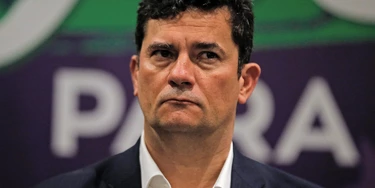 Sergio Moro durante evento de seu antigo partido, o Podemos: fazendo muxoxo para a democracia. Sergio Moro durante evento de seu antigo partido, o Podemos: fazendo muxoxo para a democracia.