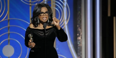 BEVERLY HILLS, CA - JANUARY 07: In this handout photo provided by NBCUniversal, Oprah Winfrey accepts the 2018 Cecil B. DeMille Award speaks onstage during the 75th Annual Golden Globe Awards at The Beverly Hilton Hotel on January 7, 2018 in Beverly Hills, California. (Photo by Paul Drinkwater/NBCUniversal via Getty Images)
