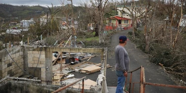 HAYALES DE COAMO, PUERTO RICO - SEPTEMBER 24: Telesforo Menendez surveys the damage in his neighborhood September 24, 2017 in Hayales de Coamo, Puerto Rico. Puerto Rico experienced widespread damage after Hurricane Maria, a category 4 hurricane, passed through. (Photo by Joe Raedle/Getty Images) HAYALES DE COAMO, PUERTO RICO - SEPTEMBER 24: Telesforo Menendez surveys the damage in his neighborhood September 24, 2017 in Hayales de Coamo, Puerto Rico. Puerto Rico experienced widespread damage after Hurricane Maria, a category 4 hurricane, passed through. (Photo by Joe Raedle/Getty Images)