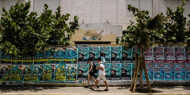 Pedestrians walk past an old hotel in the Condado area of San Juan, Puerto Rico, on Wednesday, July 8, 2015. A growing number of Republicans in the U.S. Congress are saying they want to support Puerto Rico as it wrestles with an escalating debt crisis, though they've stopped short of backing legislation allowing for municipal bankruptcy. Photographer: Christopher Gregory/Bloomberg via Getty Images Pedestrians walk past an old hotel in the Condado area of San Juan, Puerto Rico, on Wednesday, July 8, 2015. A growing number of Republicans in the U.S. Congress are saying they want to support Puerto Rico as it wrestles with an escalating debt crisis, though they've stopped short of backing legislation allowing for municipal bankruptcy. Photographer: Christopher Gregory/Bloomberg via Getty Images