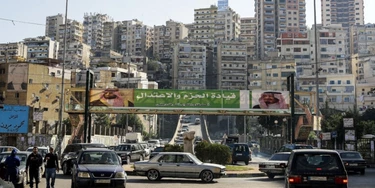 A picture taken on November 10, 2017 shows a banner bearing the images of Saudi King Salman bin Abdulaziz (R) and Crown Prince Mohammed bin Salman (L) hanging on a pedestrian crossing bridge in the northern Lebanese port city of Tripoli, between them a caption reading in Arabic "firm and moderating leadership", days after Lebanese Prime Minister Saad Hariri announced his resignation during a televised speech airing from the Saudi capital Riyadh.Hariri's announced resignation sparked concerns of a political crisis in Lebanon as tensions between Saudi Arabia and Iran escalated. / AFP PHOTO / JOSEPH EID (Photo credit should read JOSEPH EID/AFP/Getty Images) A picture taken on November 10, 2017 shows a banner bearing the images of Saudi King Salman bin Abdulaziz (R) and Crown Prince Mohammed bin Salman (L) hanging on a pedestrian crossing bridge in the northern Lebanese port city of Tripoli, between them a caption reading in Arabic "firm and moderating leadership", days after Lebanese Prime Minister Saad Hariri announced his resignation during a televised speech airing from the Saudi capital Riyadh.Hariri's announced resignation sparked concerns of a political crisis in Lebanon as tensions between Saudi Arabia and Iran escalated. / AFP PHOTO / JOSEPH EID (Photo credit should read JOSEPH EID/AFP/Getty Images)