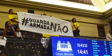 RIO DE JANEIRO (RJ), 01/04/2025 - VEREADORES/DISCUTEM/ARMAR/GUARDA CIVIL/RIO - Na Câmara dos Vereadores, no centro do Rio de Janeiro, vereadores analisam proposta de armamento da Guarda Municipal da capital carioca, nesta terça-feira (1). (Foto: Paulo Carneiro/Ato Press/Folhapress) RIO DE JANEIRO (RJ), 01/04/2025 - VEREADORES/DISCUTEM/ARMAR/GUARDA CIVIL/RIO - Na Câmara dos Vereadores, no centro do Rio de Janeiro, vereadores analisam proposta de armamento da Guarda Municipal da capital carioca, nesta terça-feira (1). (Foto: Paulo Carneiro/Ato Press/Folhapress)