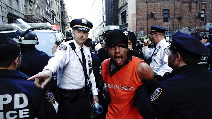 A demonstrator is arrested by police officers during a protest April 29, 2015 at Union Square in New York, held in solidarity with demonstrators in Baltimore, Maryland demanding justice for an African-American man who died of severe spinal injuries sustained in police custody.    AFP PHOTO/Eduardo Munoz Alvarez        (Photo credit should read EDUARDO MUNOZ ALVAREZ/AFP/Getty Images)
