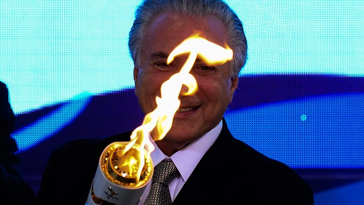 Brazilian acting President Michel Temer attends the reception ceremony of the Paralympic Torch at Planalto Palace in Brasilia, on August 25, 2016.
The Rio 2016 Paralympic Games will be held in Brazil from September 7 through 18. / AFP / ANDRESSA ANHOLETE        (Photo credit should read ANDRESSA ANHOLETE/AFP/Getty Images)