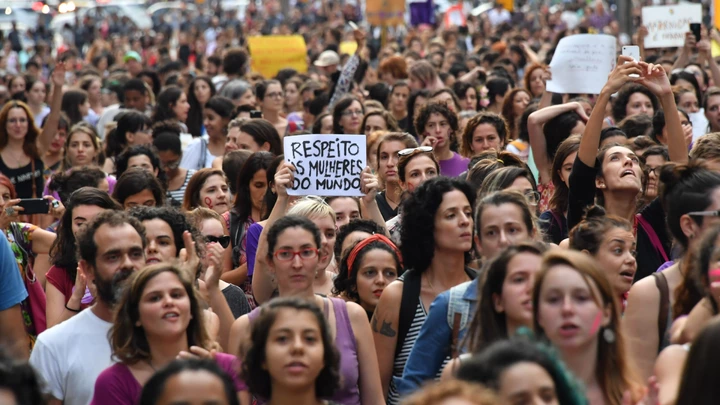 Hundreds of people take part in the commemoration of the International Women's Day at Paulista Avenue in Sao Paulo, Brazil on March 8, 2017.The International Women's Day is marked worldwide with rallies and strikes. / AFP PHOTO / NELSON ALMEIDA (Photo credit should read NELSON ALMEIDA/AFP/Getty Images)