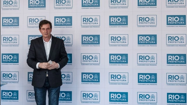 Rio de Janeiro's Mayor Marcelo Crivella attends the unveiling ceremony of a graffiti by 19-year-old self-taught Brazilian artist Luna Buschinelli, as part of the "Rio Big Walls" project in Rio de Janeiro, Brazil, on June 19, 2017.The graffiti has applied for the Guinness Book of records as the world's biggest wall painting by a female artist. / AFP PHOTO / YASUYOSHI CHIBA (Photo credit should read YASUYOSHI CHIBA/AFP/Getty Images) Rio de Janeiro's Mayor Marcelo Crivella attends the unveiling ceremony of a graffiti by 19-year-old self-taught Brazilian artist Luna Buschinelli, as part of the "Rio Big Walls" project in Rio de Janeiro, Brazil, on June 19, 2017.The graffiti has applied for the Guinness Book of records as the world's biggest wall painting by a female artist. / AFP PHOTO / YASUYOSHI CHIBA (Photo credit should read YASUYOSHI CHIBA/AFP/Getty Images)