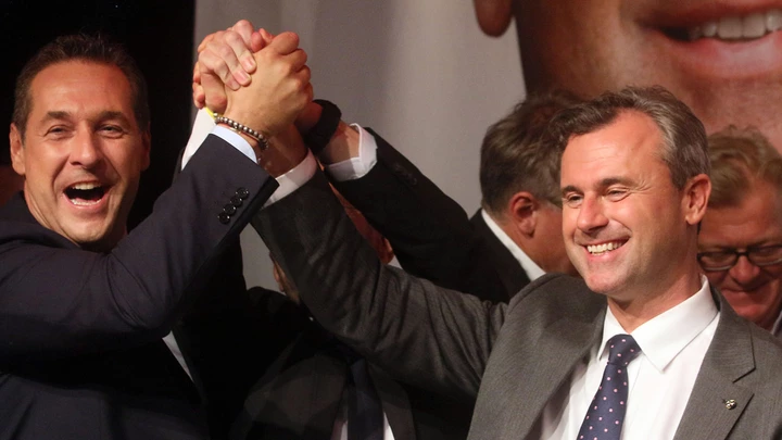 Heinz-Christian Strache, head of Austria's Freedom Party, FPOE, left, congratulates Norbert Hofer, candidate for Austria's Presidency during an after presidential election party in Vienna, Austria, Sunday, May 22, 2016.  Heinz-Christian Strache, head of Austria's Freedom Party, FPOE, left, congratulates Norbert Hofer, candidate for Austria's Presidency during an after presidential election party in Vienna, Austria, Sunday, May 22, 2016.