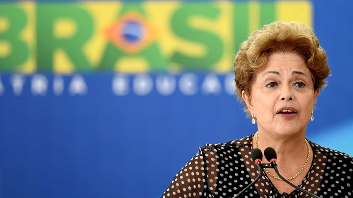Brazilian President Dilma Rousseff speaks during inauguration ceremony of new Minister of Social Communication Edinho Silva at the Planalto Palace in Brasilia, Brazil, on 31 March 2015.  AFP PHOTO/EVARISTO SA        (Photo credit should read EVARISTO SA/AFP/Getty Images)