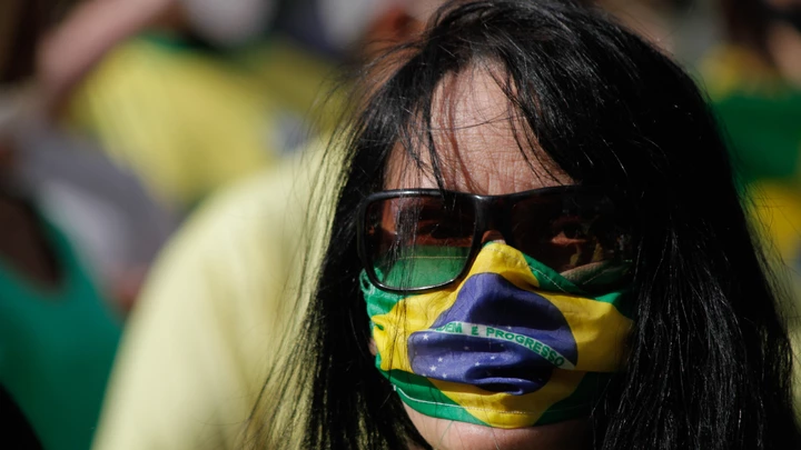Supporters of Brazilian President Jair Bolsonaro close Avenida Paulista, in the central region of the city of Sao Paulo, Brazil, on May 3, 2020, during an act in support of the president and for the reopening of trade and against Sao Paulo governor Joao Doria, who extended the quarantine in the state to prevent the spread of the new coronavirus (covid-19), which occurs through contact and clusters of people. The quarantine continues until May 10. (Photo by Fabio Vieira/FotoRua/NurPhoto via Getty Images) Supporters of Brazilian President Jair Bolsonaro close Avenida Paulista, in the central region of the city of Sao Paulo, Brazil, on May 3, 2020, during an act in support of the president and for the reopening of trade and against Sao Paulo governor Joao Doria, who extended the quarantine in the state to prevent the spread of the new coronavirus (covid-19), which occurs through contact and clusters of people. The quarantine continues until May 10. (Photo by Fabio Vieira/FotoRua/NurPhoto via Getty Images)